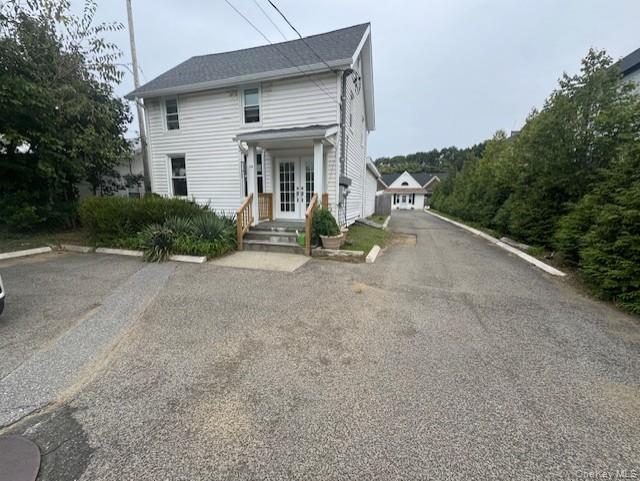 150 Bedford Road Armonk, NY 10504 - Photo 13 of 15 Front Exterior with View of the cottage