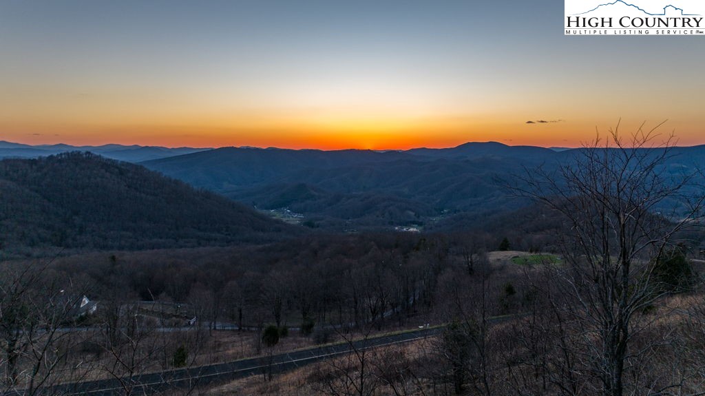 C105 Acorn Nvno Road Zionville, NC 28698 - Photo 18 of 35 a view of a yard next to a house