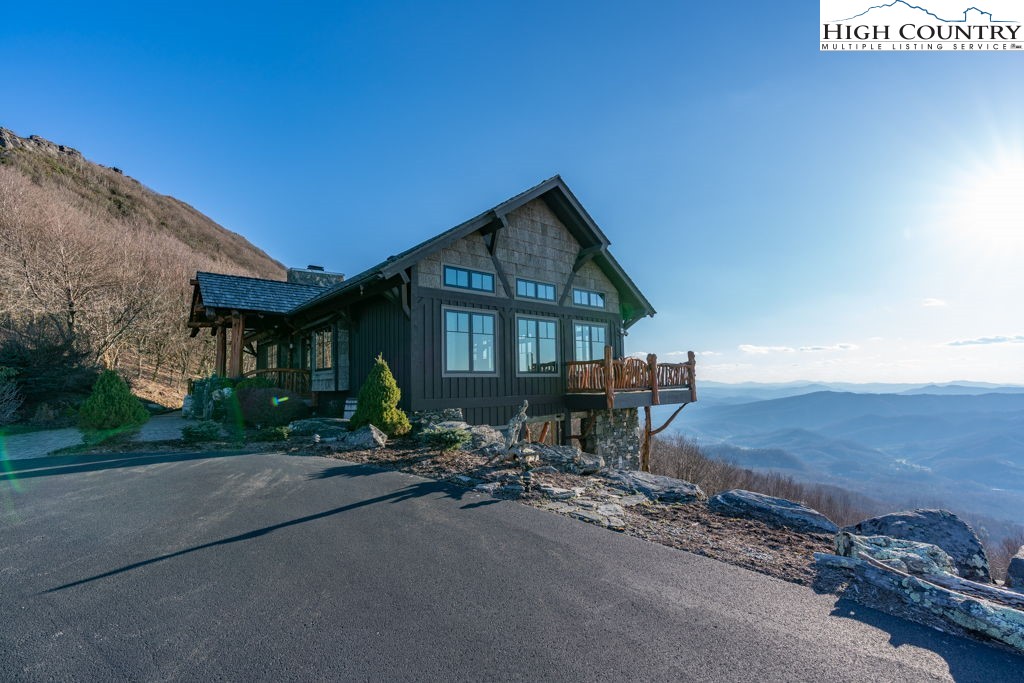 C105 Acorn Nvno Road Zionville, NC 28698 - Photo 20 of 35 a front view of a house with sitting area