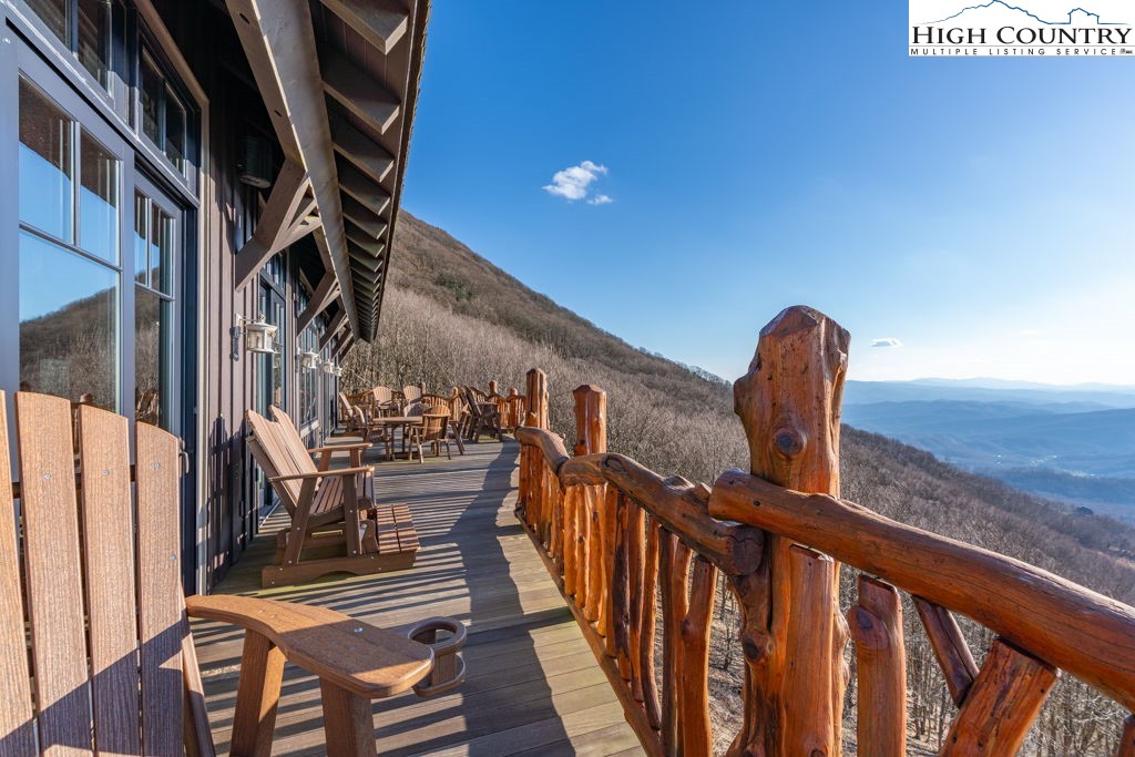 C105 Acorn Nvno Road Zionville, NC 28698 - Photo 22 of 35 a view of balcony with wooden floor and fence