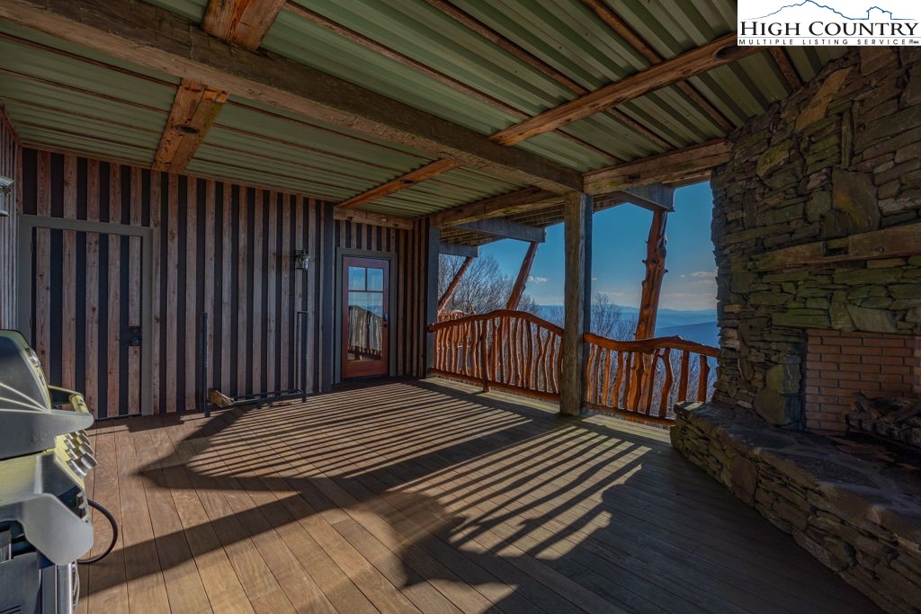 C105 Acorn Nvno Road Zionville, NC 28698 - Photo 24 of 35 a view of balcony with wooden floor