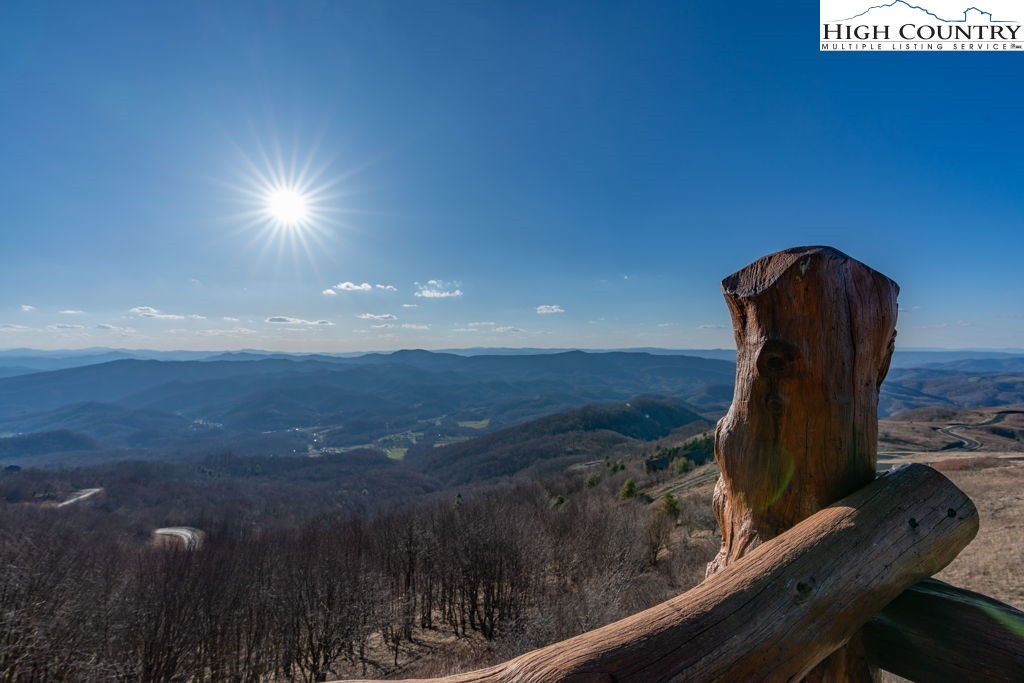 C105 Acorn Nvno Road Zionville, NC 28698 - Photo 26 of 35 a view of a balcony with chair and wooden floor