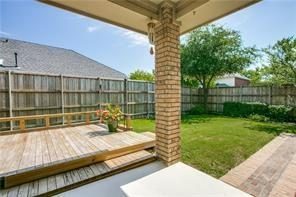 544 Lake Forest Drive Coppell, TX 75019 - Photo 23 of 24 a view of a swimming pool with a patio