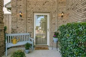 a view of a porch with a bench