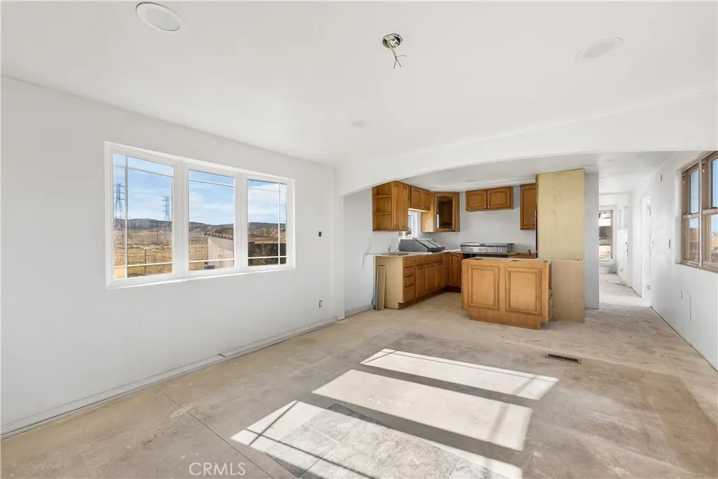 0 Bellbird Place Lancaster, CA 93534 - Photo 14 of 44 a large white kitchen with a sink and cabinets