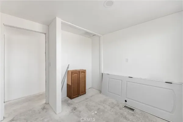 a bathroom with a granite countertop sink and a bathtub