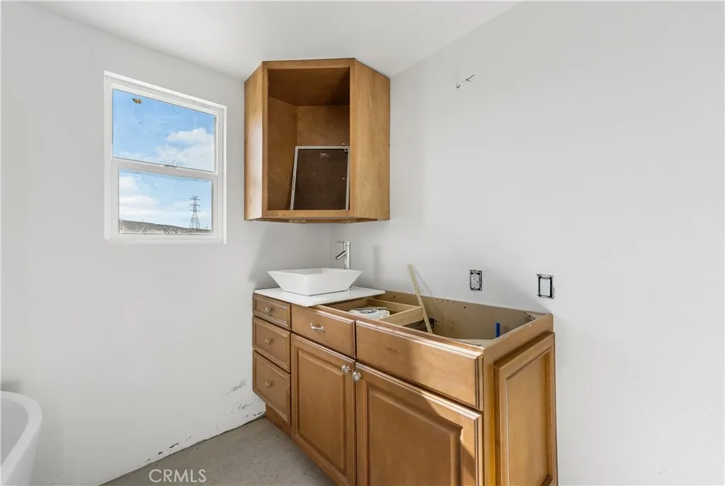 0 Bellbird Place Lancaster, CA 93534 - Photo 31 of 44 a utility room with dryer and washer