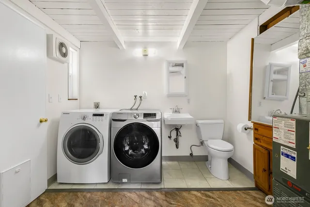 a utility room with dryer and washer