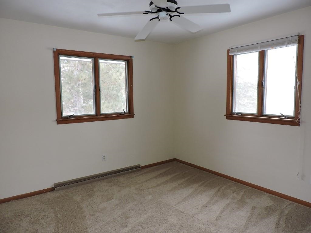 4894 Brookview Road Rockford, IL 61107 - Photo 12 of 21 an empty room with a window