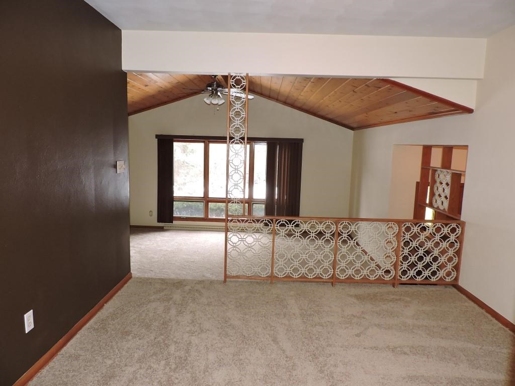 4894 Brookview Road Rockford, IL 61107 - Photo 5 of 21 an empty room with windows