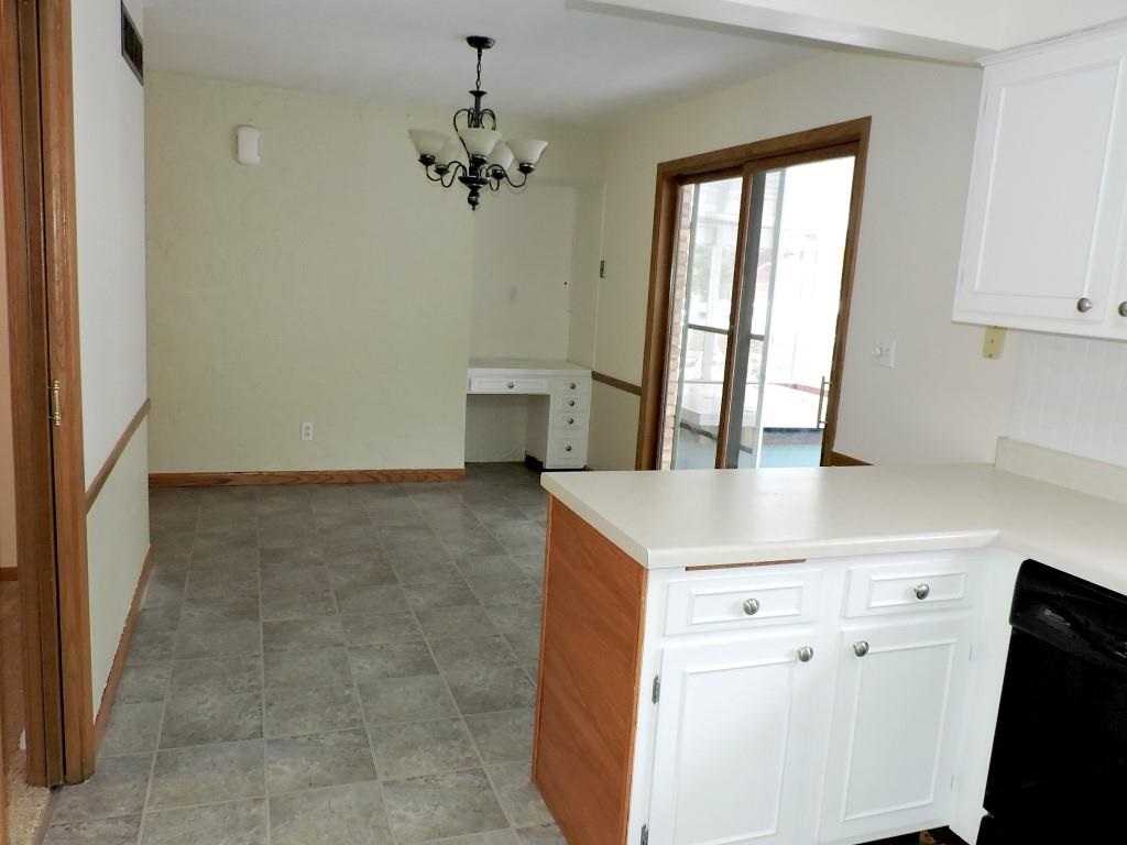 4894 Brookview Road Rockford, IL 61107 - Photo 8 of 21 a view of kitchen with furniture and window