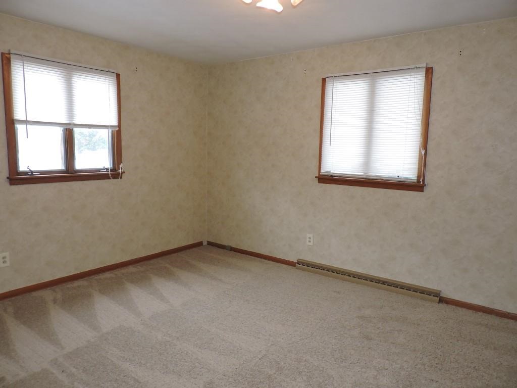 4894 Brookview Road Rockford, IL 61107 - Photo 10 of 21 an empty room with a window