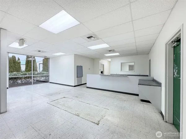 a view of a room with a large window