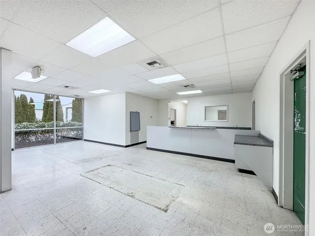 a view of a room with a large window