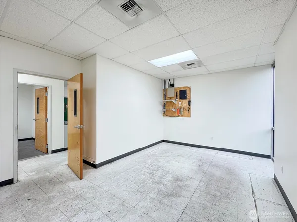 a bathroom with a sink toilet and mirror