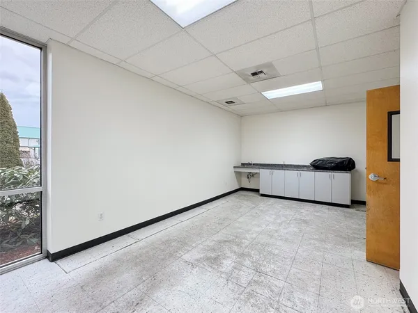 a view of a room with a garage