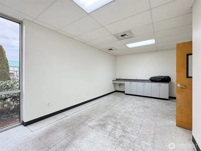 a view of a room with a garage