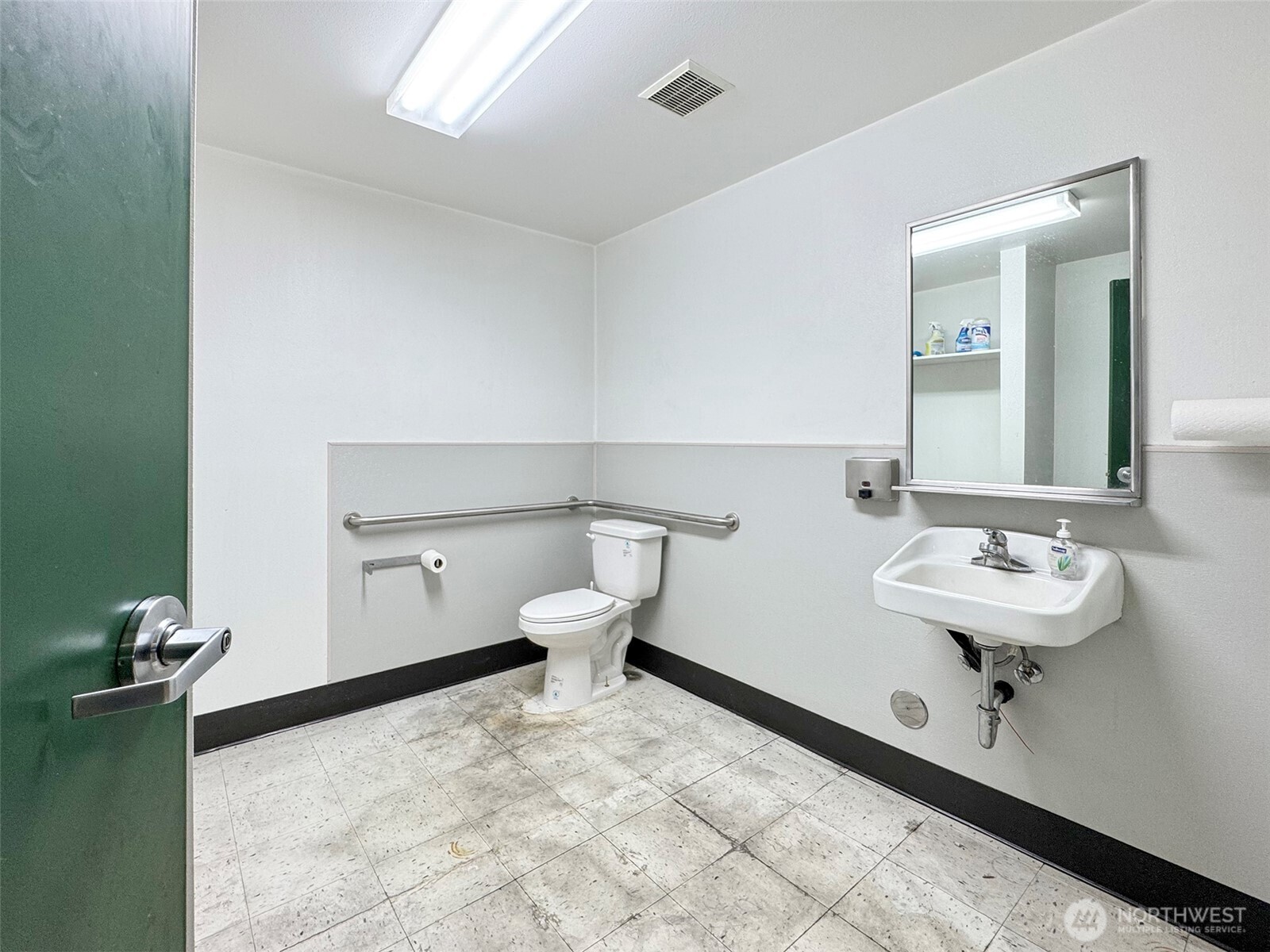 301 Business Park Loop Carlsborg, WA 98382 - Photo 20 of 36 a bathroom with a sink toilet and mirror