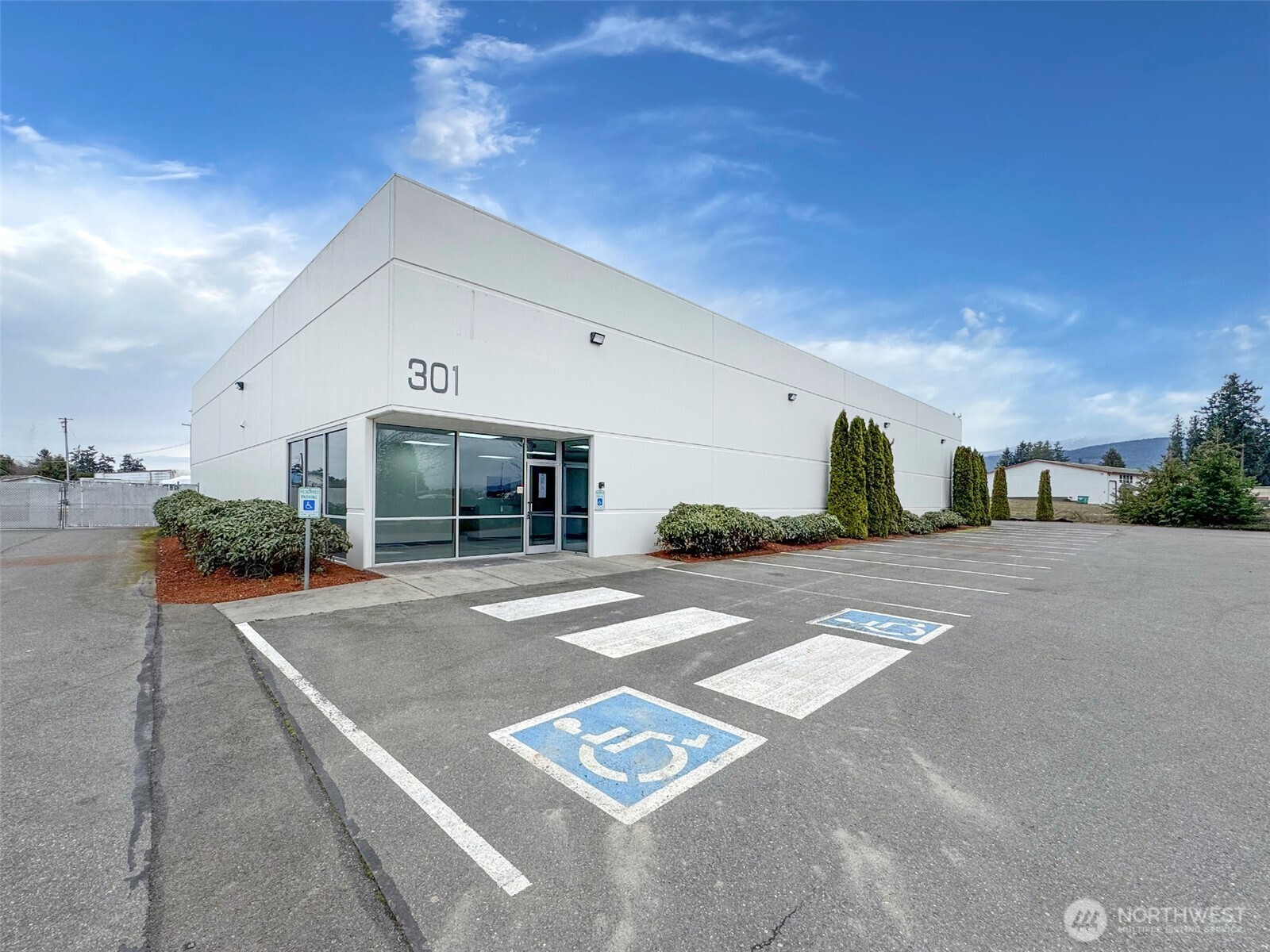 301 Business Park Loop Carlsborg, WA 98382 - Photo 2 of 36 a view of a house with a street