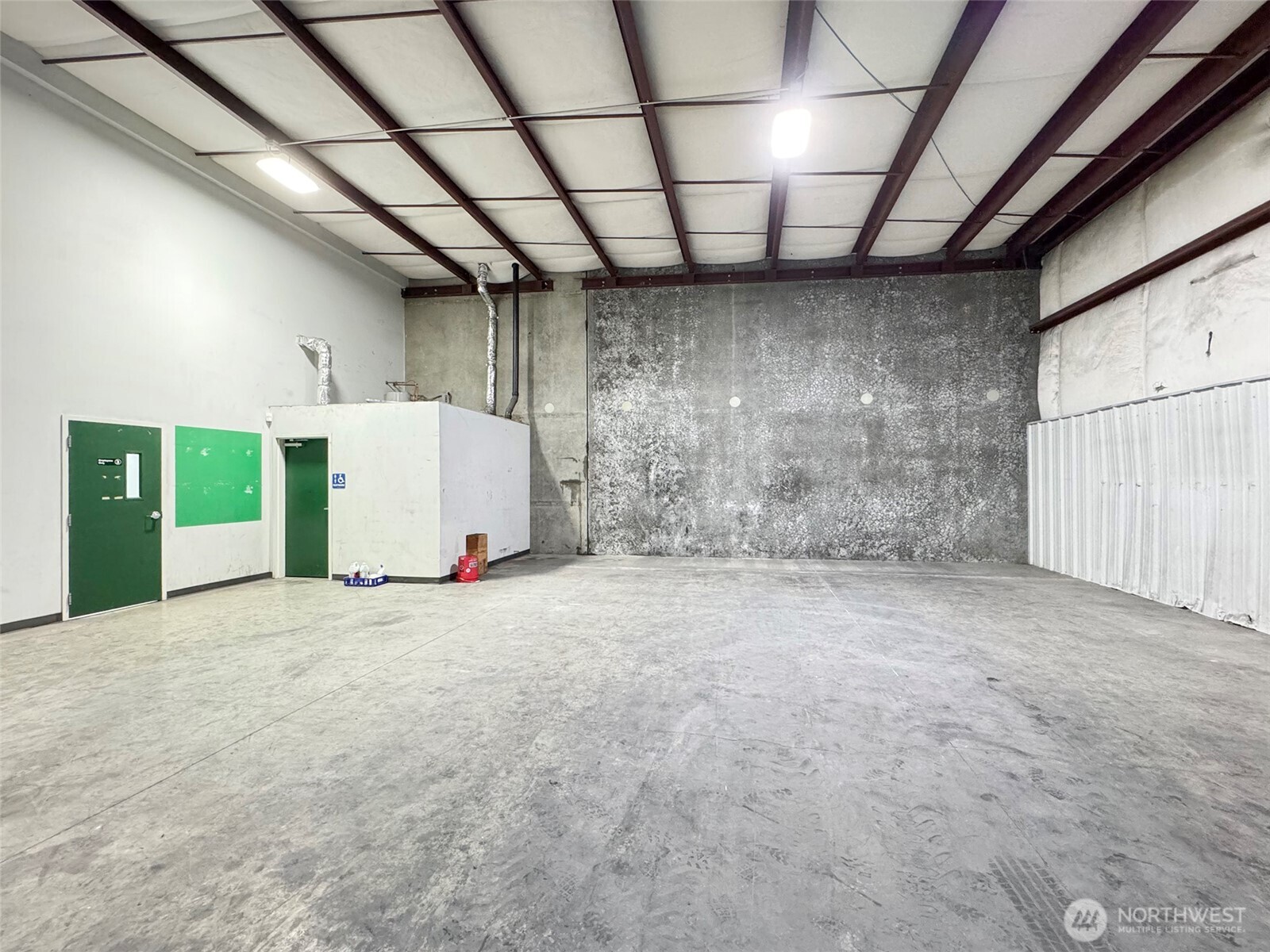 301 Business Park Loop Carlsborg, WA 98382 - Photo 21 of 36 a view of a room with a garage