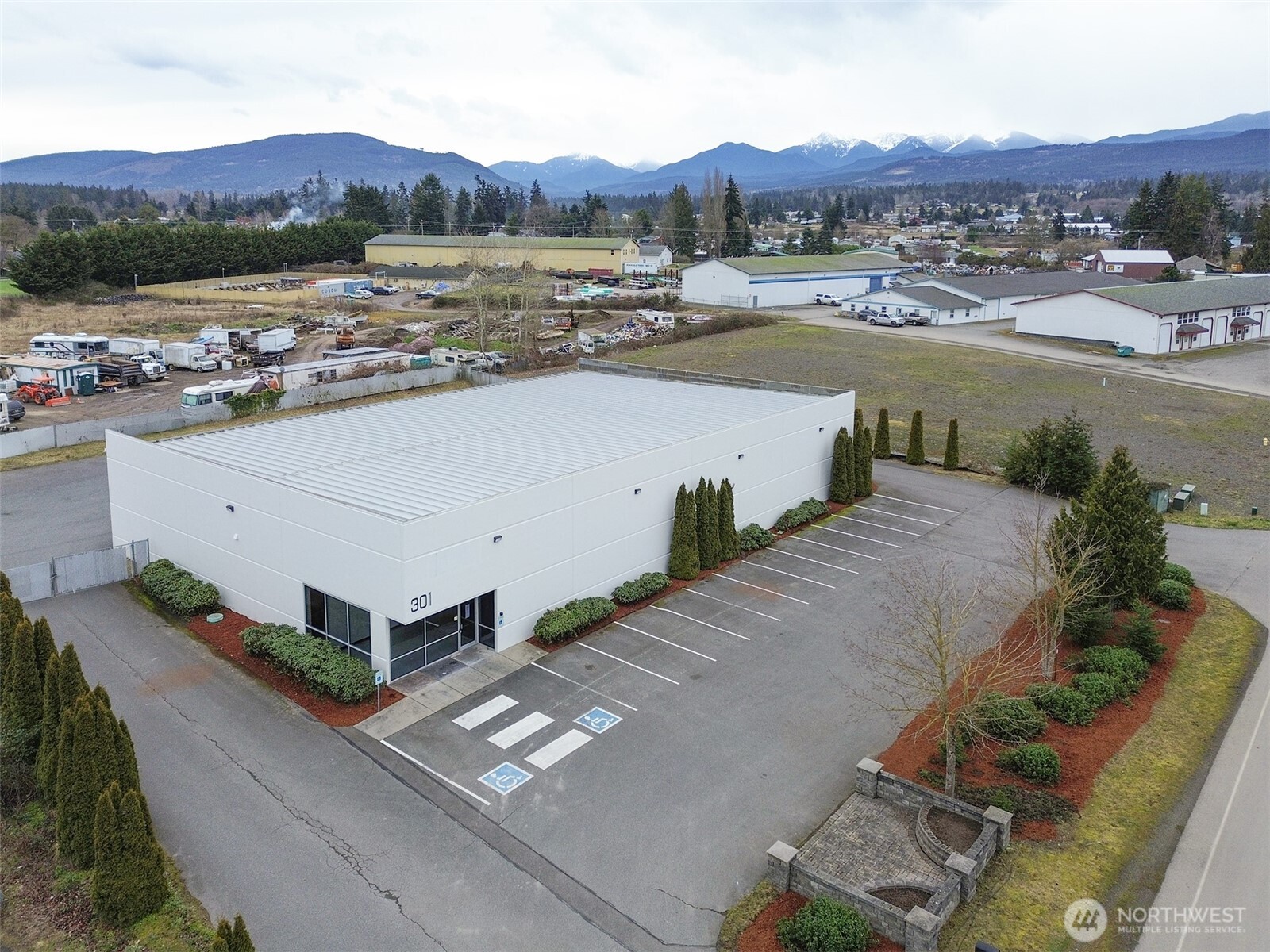 301 Business Park Loop Carlsborg, WA 98382 - Photo 36 of 36 an aerial view of residential houses with outdoor space and river