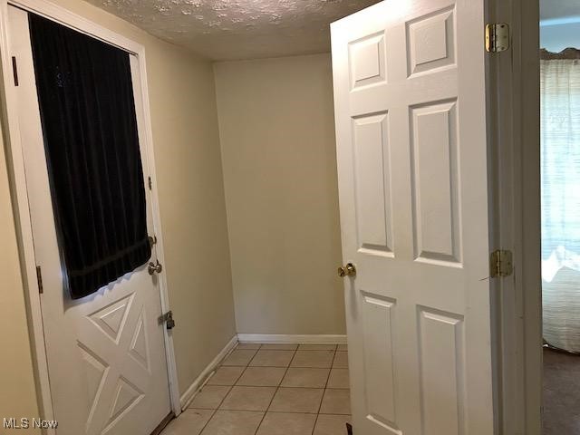 3065 Polly Road Ravenna, OH 44266 - Photo 11 of 11 Doorway featuring a tile patterned floors