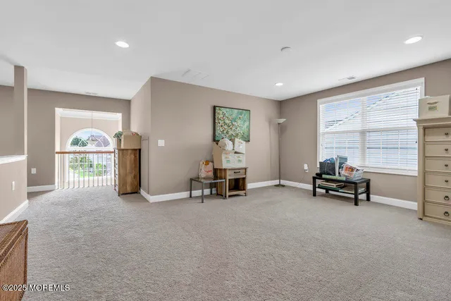 a view of a livingroom with furniture and a couch