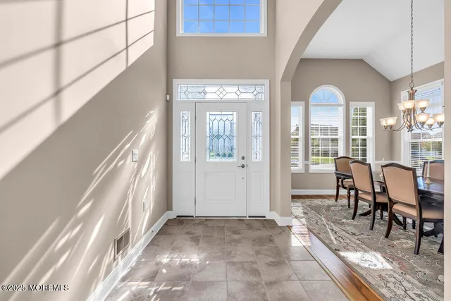 a view of a livingroom with furniture and window