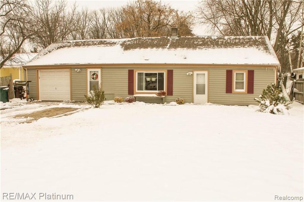 923 East Jolly Road Lansing, MI 48910 - Photo 1 of 21