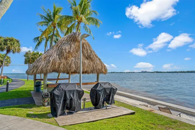 a view of a lake with a sitting space