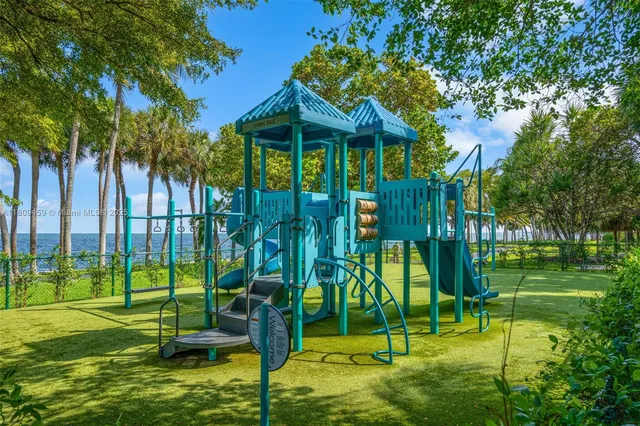 a view of a park with a slide