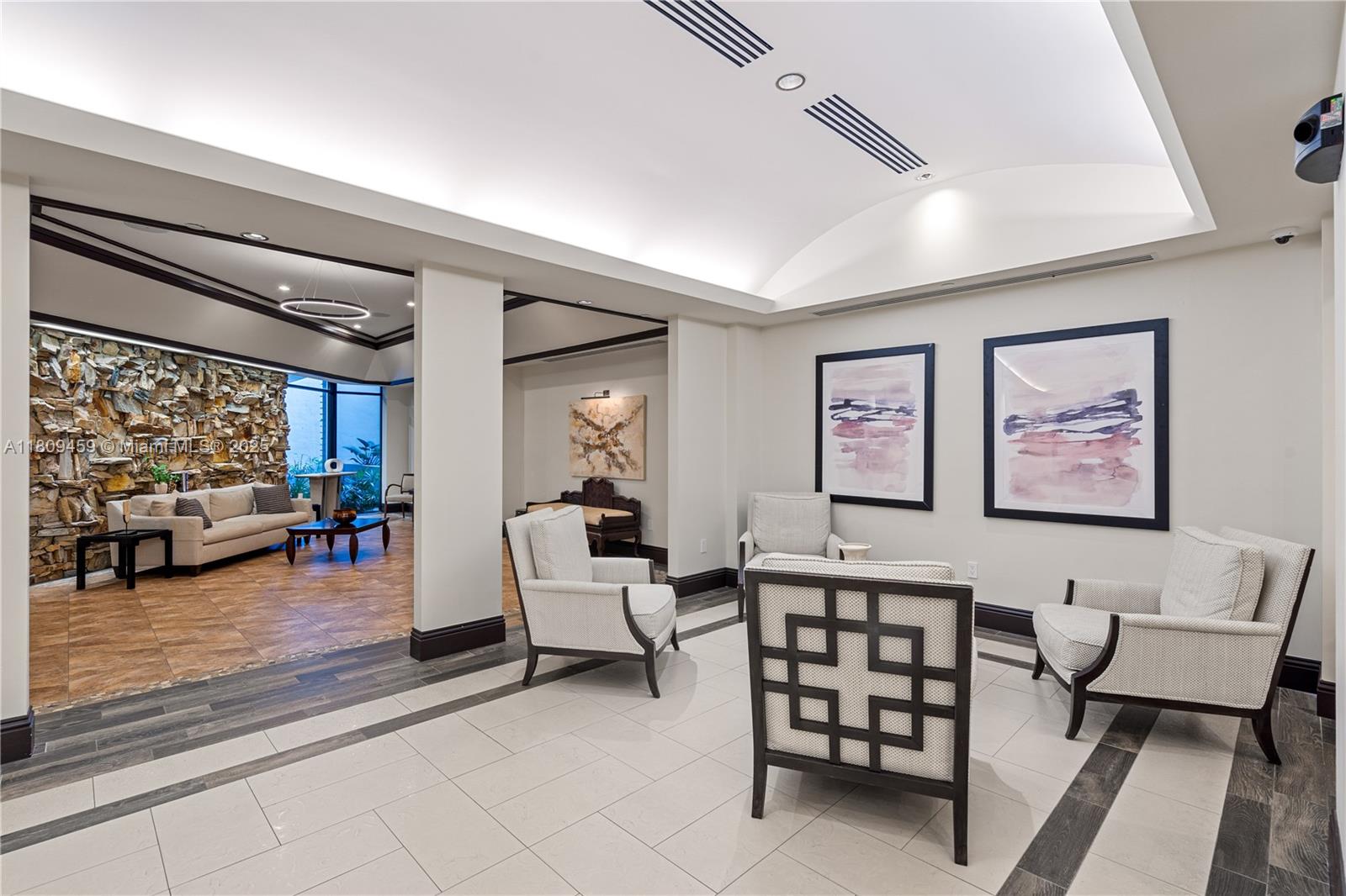 3 Grove Isle Drive, Unit C1610 Miami, FL 33133 - Photo 25 of 33 a view of a livingroom with furniture and a couch