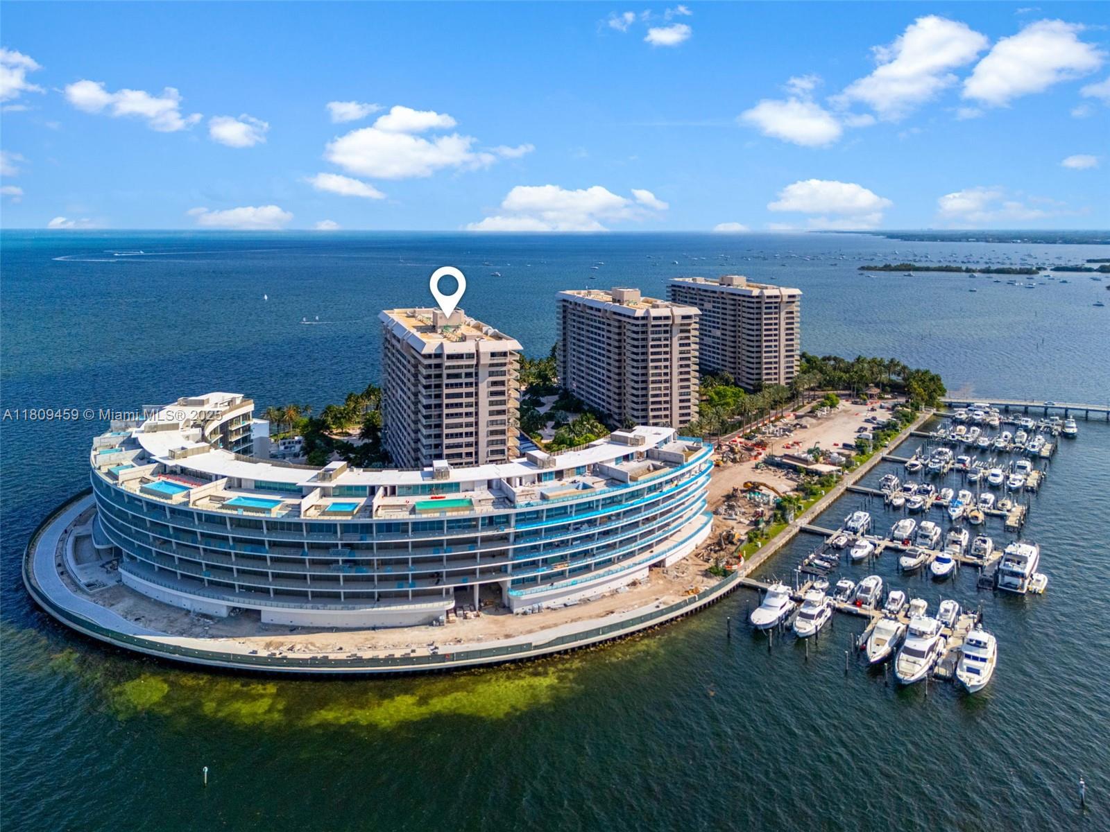 3 Grove Isle Drive, Unit C1610 Miami, FL 33133 - Photo 31 of 33 a view of a room with gym equipment