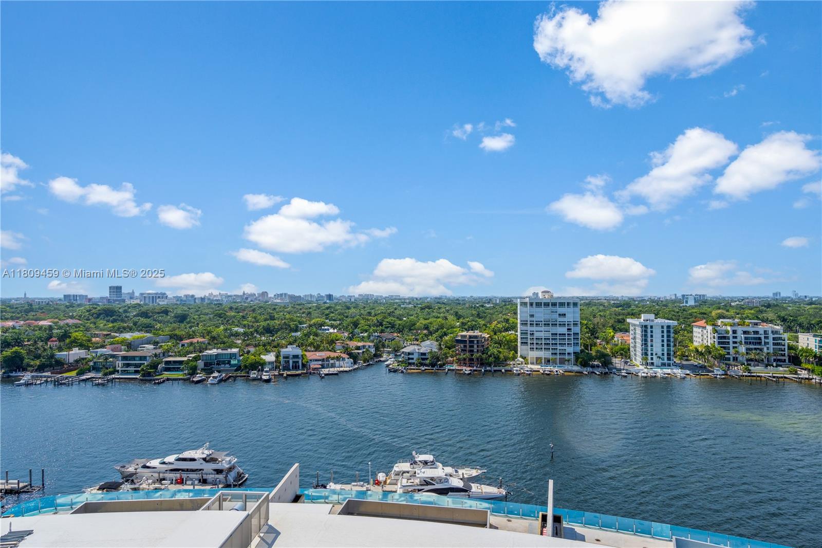 3 Grove Isle Drive, Unit C1610 Miami, FL 33133 - Photo 9 of 33 a view of a lake and a mountain