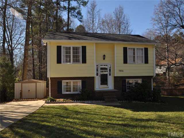 7804 Nugget Lane Raleigh, NC 27615 - Photo 1 of 10 a front view of a house with a yard