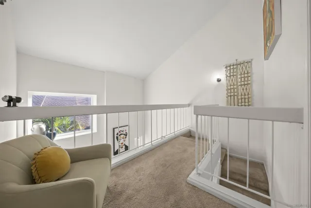 a view of livingroom with furniture and window