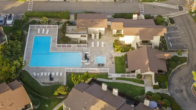 an aerial view of a house with outdoor space