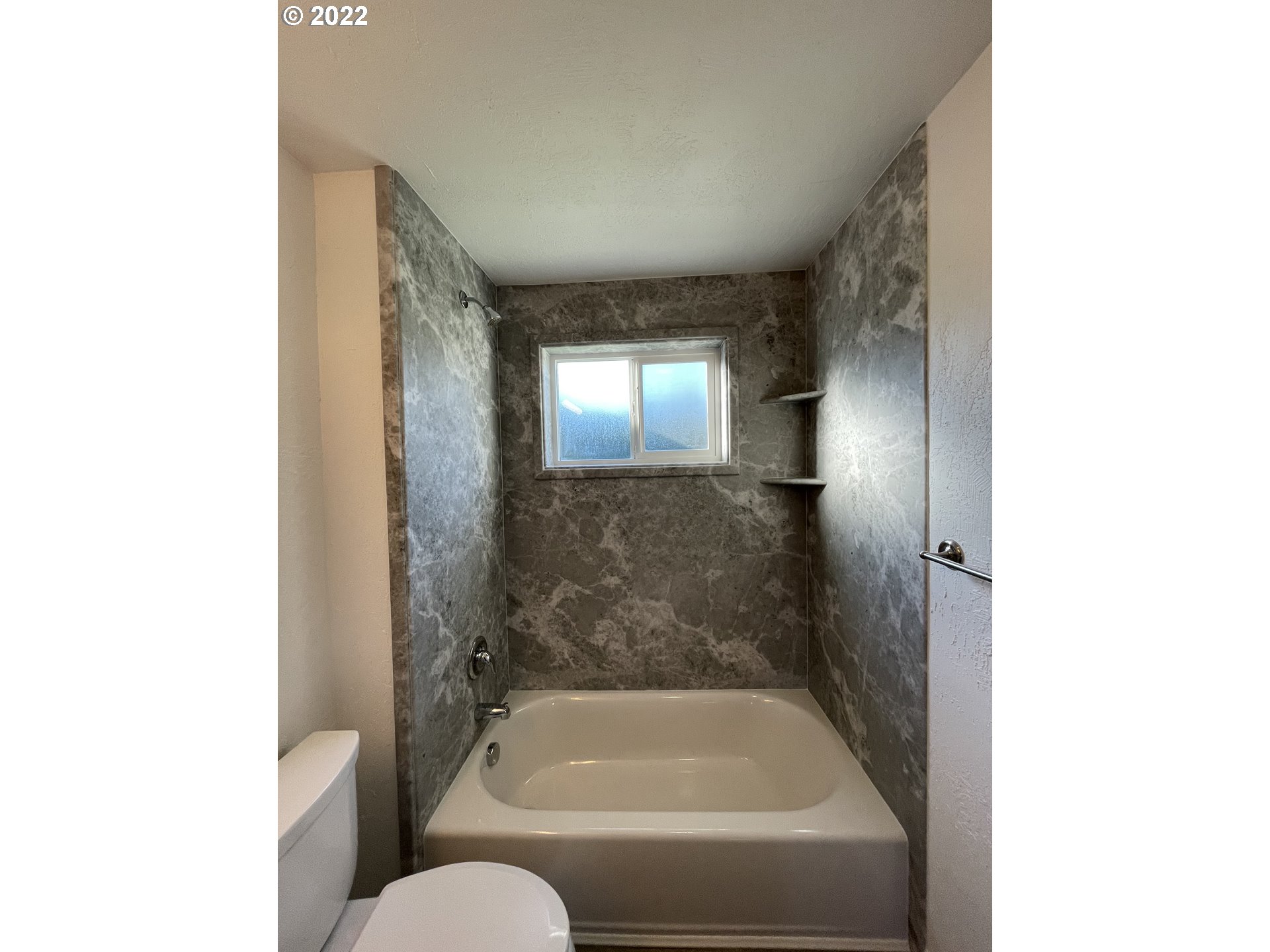 616 32nd Street Springfield, OR 97478 - Photo 20 of 28 a bathroom with a sink and a bathtub
