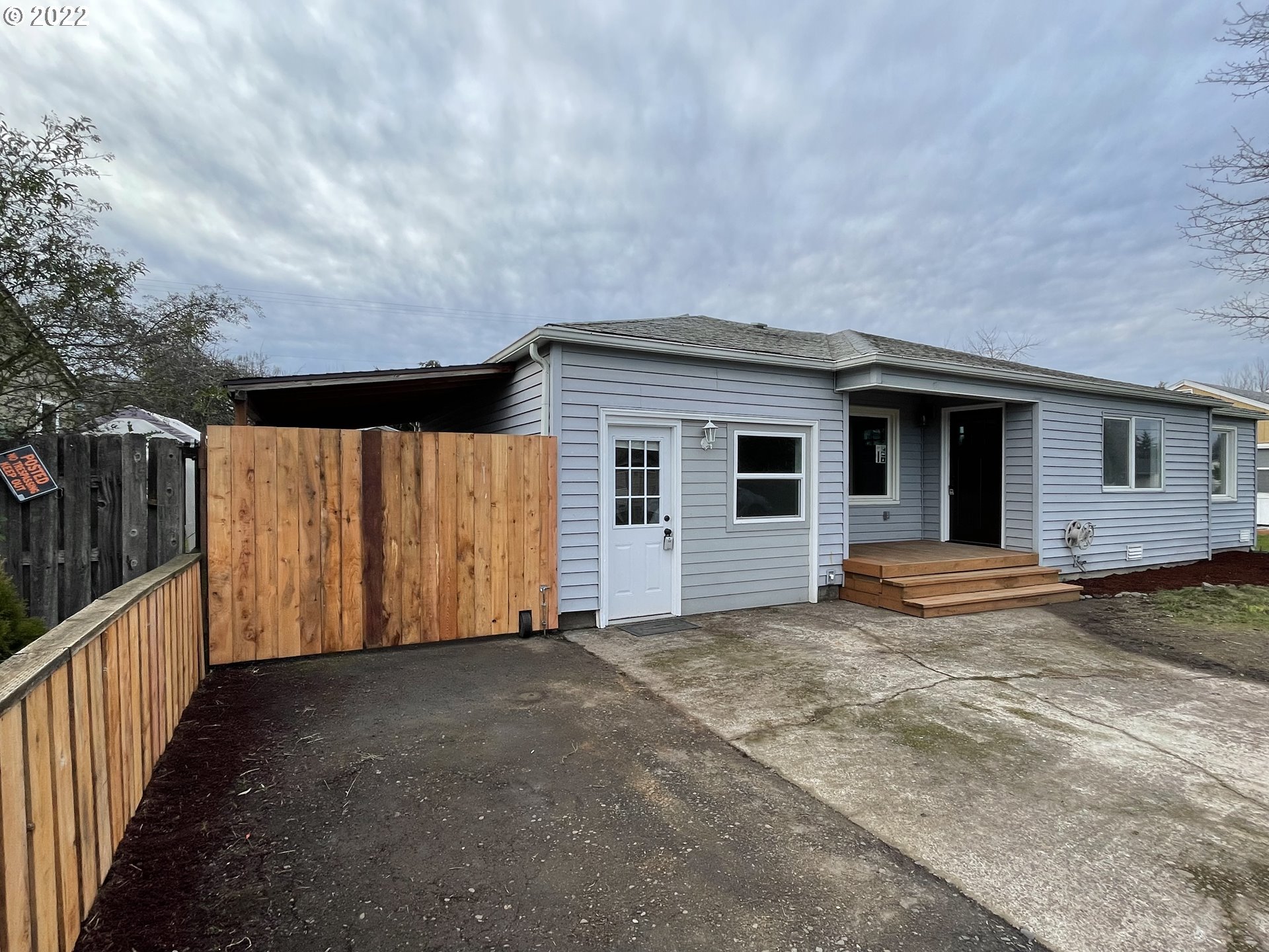 616 32nd Street Springfield, OR 97478 - Photo 2 of 28 a view of a house with wooden fence