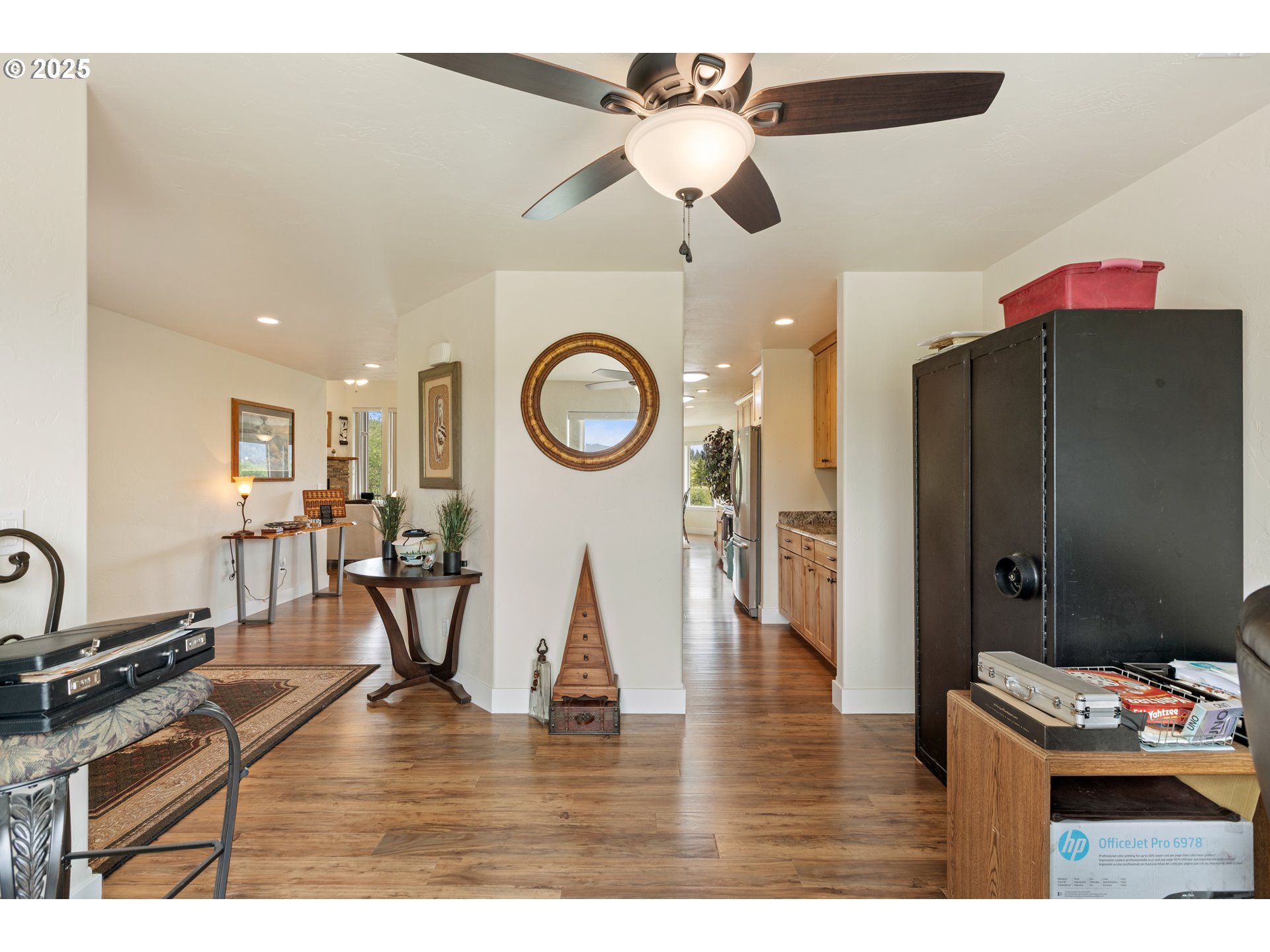 910 Swallow Avenue Sutherlin, OR 97479 - Photo 14 of 44 a living room with furniture and a clock