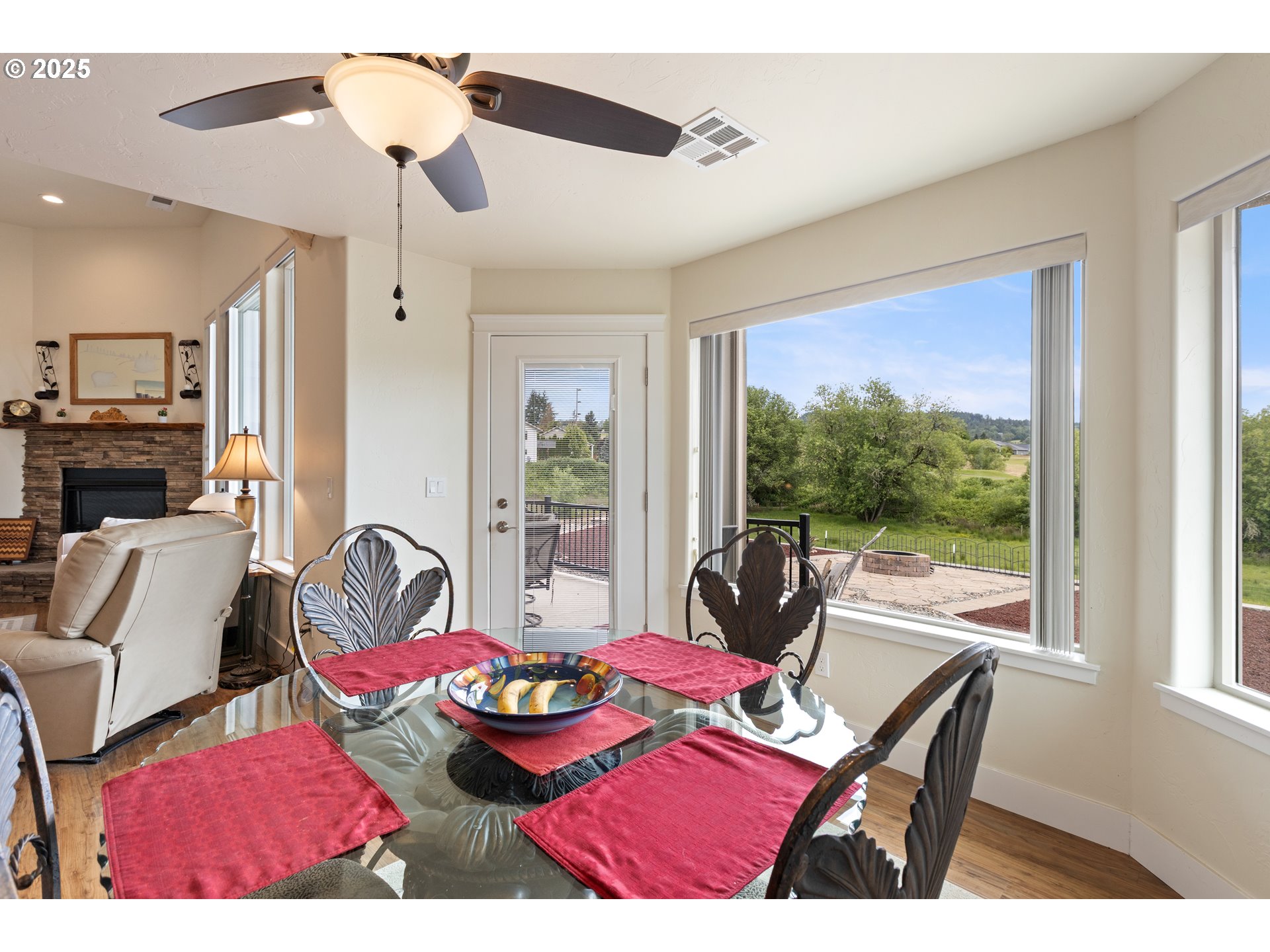 910 Swallow Avenue Sutherlin, OR 97479 - Photo 15 of 44 a view of a dining room with furniture window and outside view
