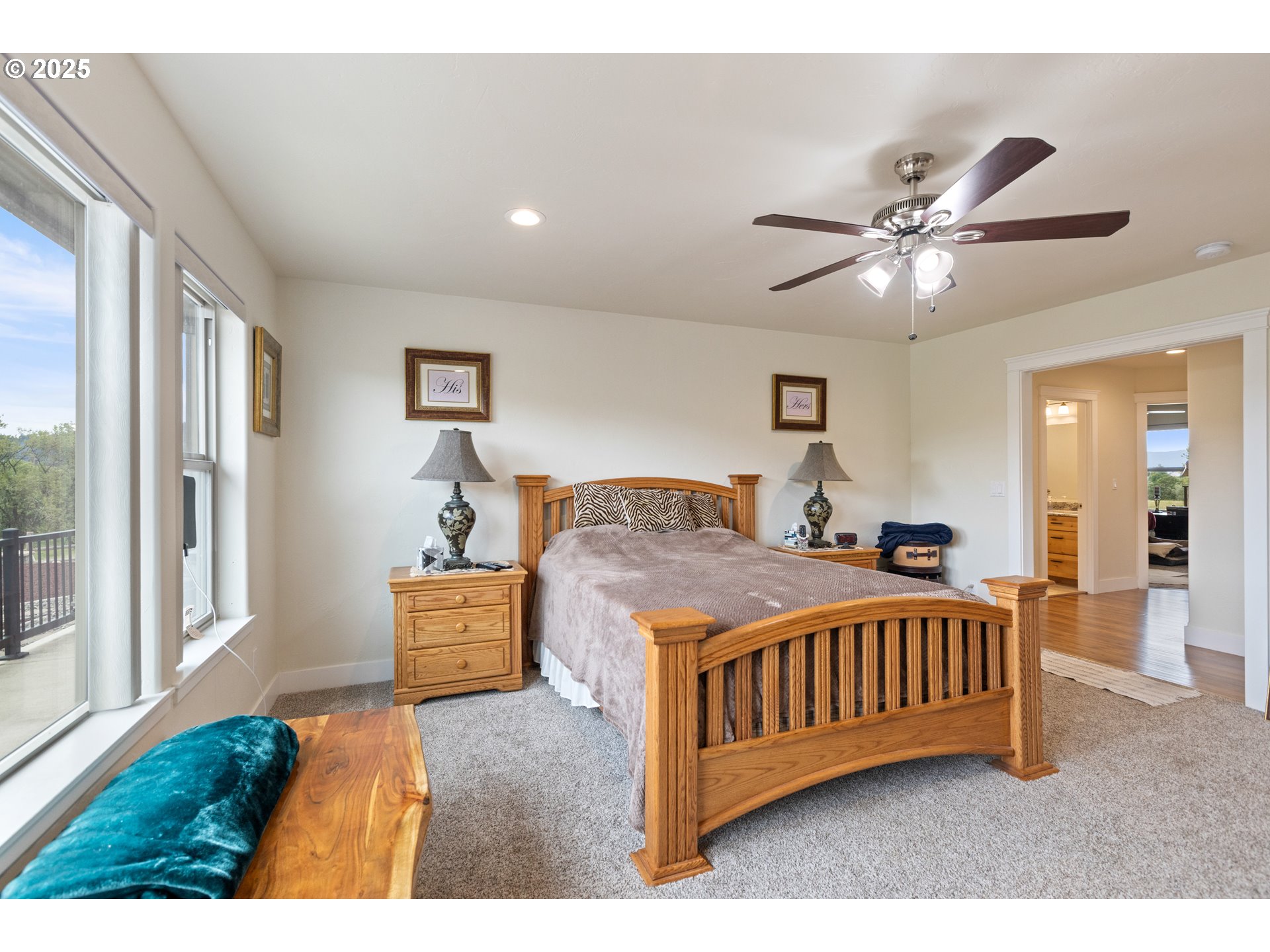 910 Swallow Avenue Sutherlin, OR 97479 - Photo 19 of 44 a bedroom with furniture and a large window