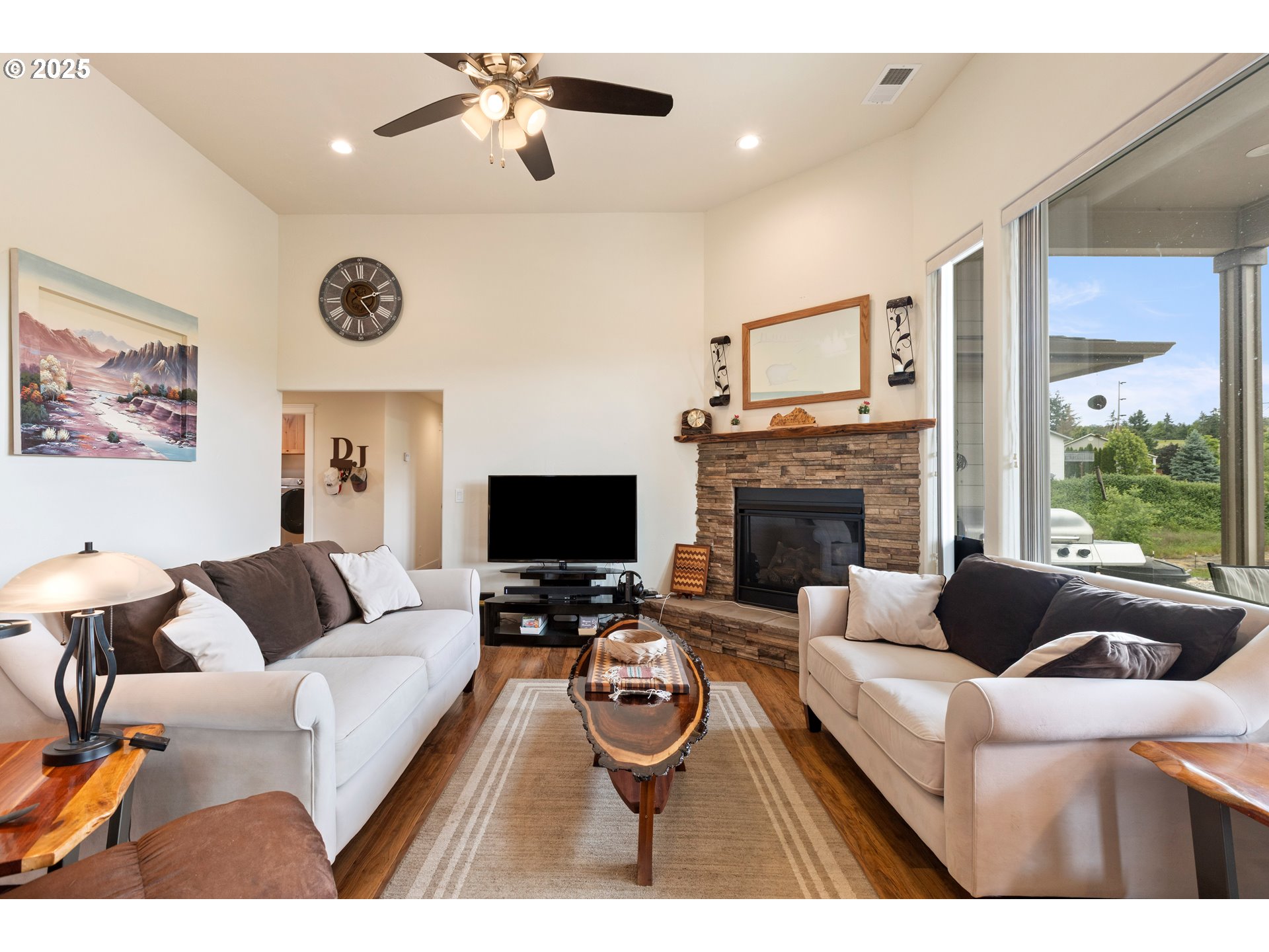910 Swallow Avenue Sutherlin, OR 97479 - Photo 3 of 44 a living room with furniture and a fireplace