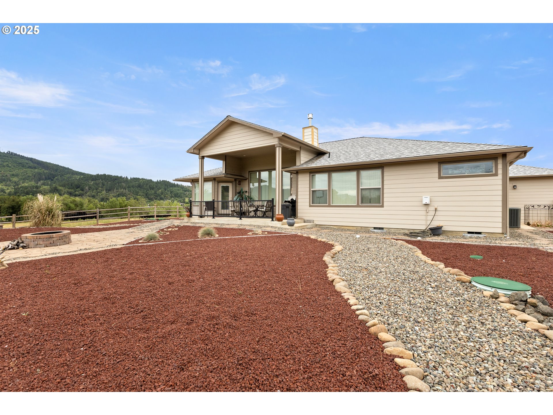 910 Swallow Avenue Sutherlin, OR 97479 - Photo 43 of 44 a view of house with yard and ocean view