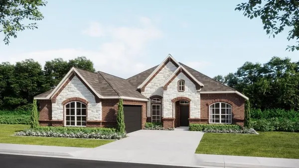 a view of a white house with a big yard and potted plants