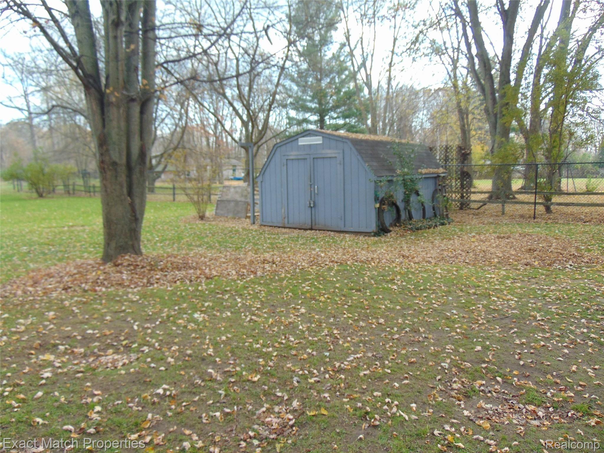 4886 North Stark Road Hope, MI 48628 - Photo 14 of 16 Another view of he Backyard with Shed / Chicken Coop...