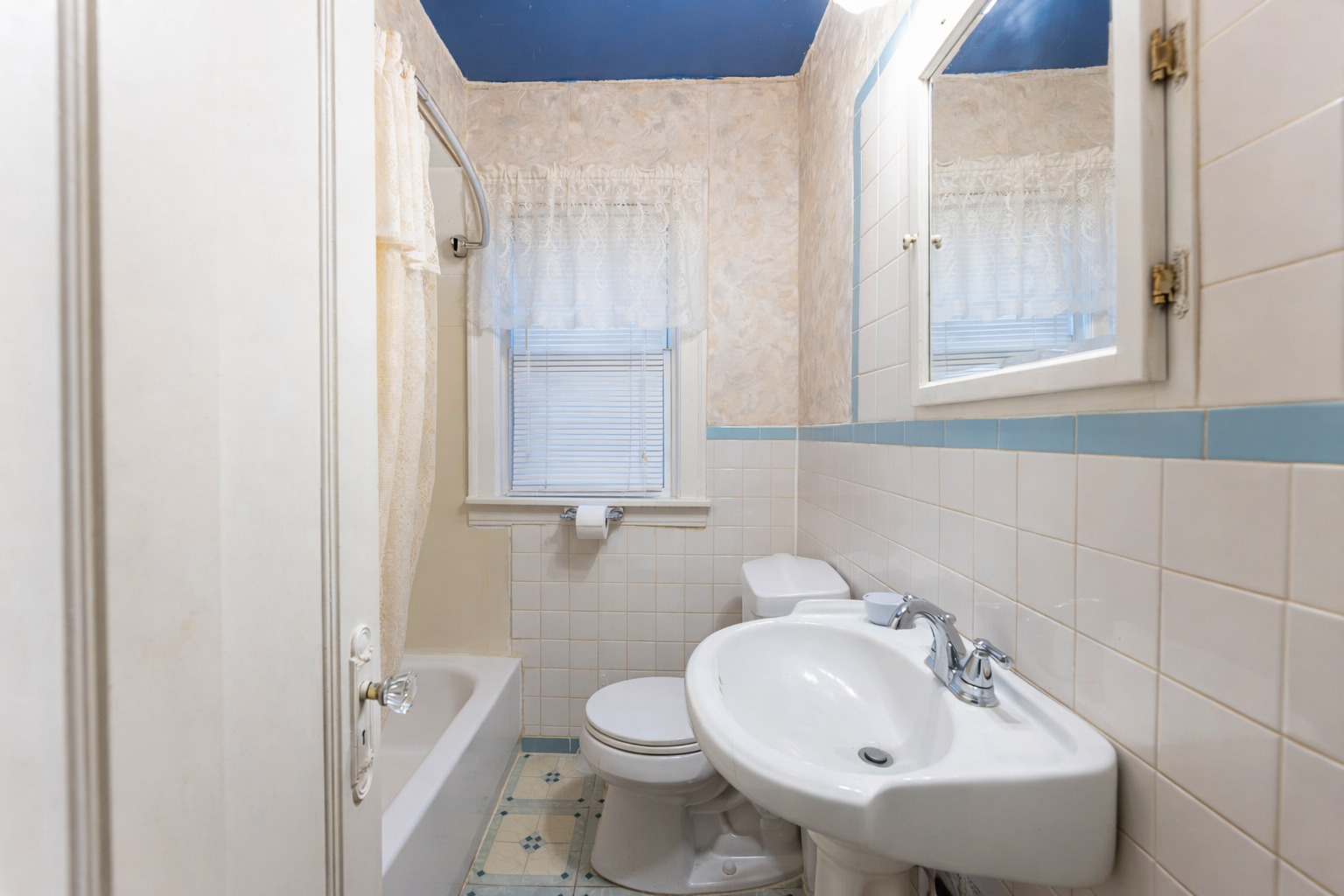 8129 South Cornell Avenue Chicago, IL 60617 - Photo 11 of 18 a bathroom with a sink and a toilet