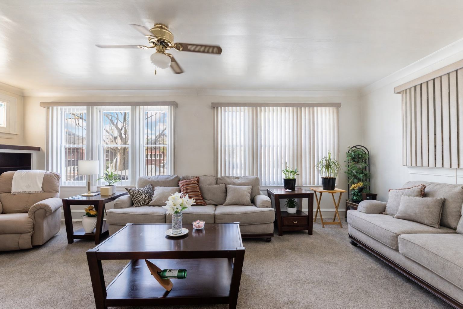 8129 South Cornell Avenue Chicago, IL 60617 - Photo 3 of 18 a living room with furniture and a large window