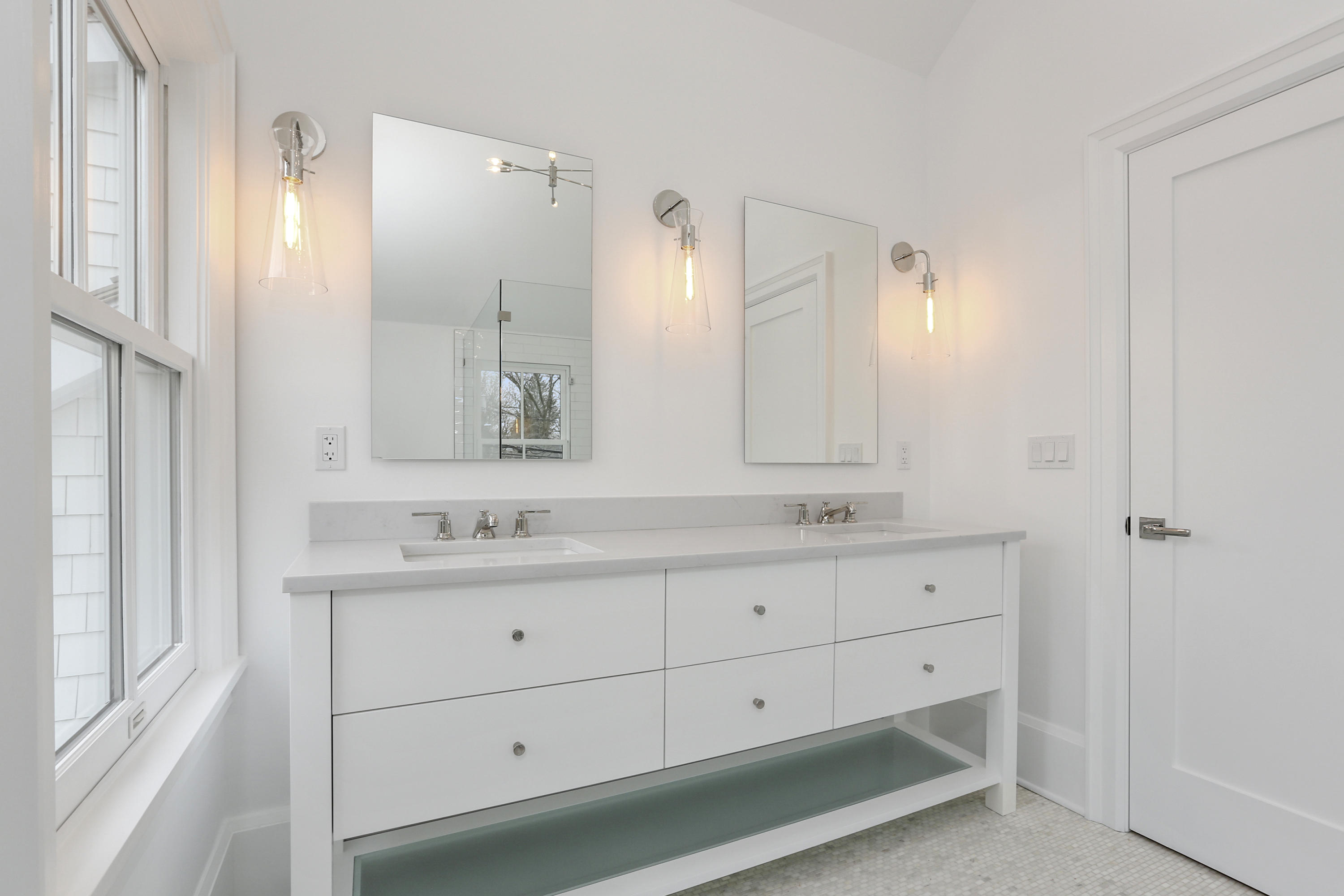 693 Post Road Darien, CT 06820 - Photo 15 of 41 a bathroom with a double vanity sink mirror and double