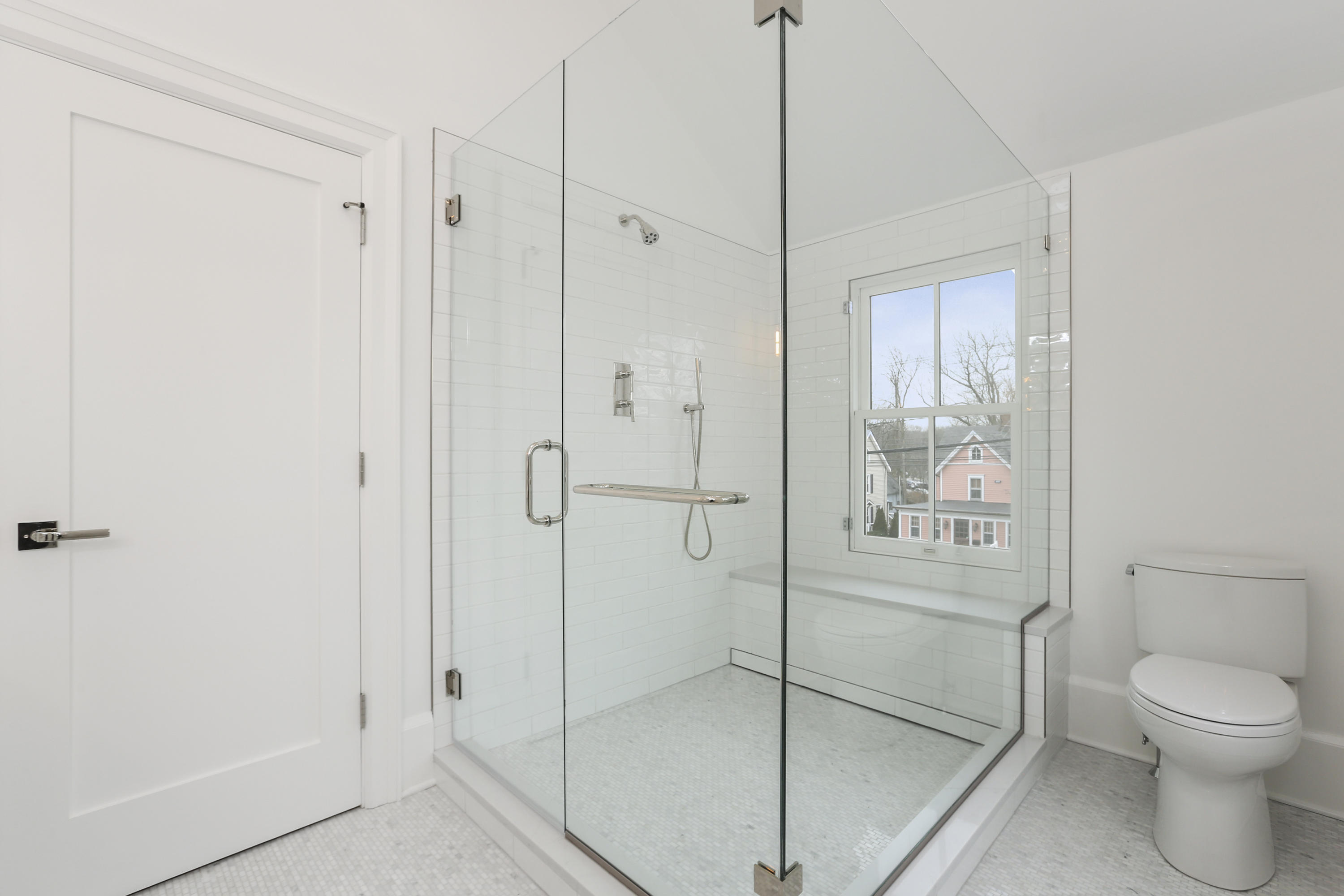 693 Post Road Darien, CT 06820 - Photo 16 of 41 a bathroom with a shower a toilet and a sink